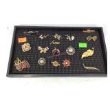 Display with brooches