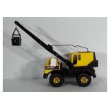Tonka Bucket Crane. Materials are metal and