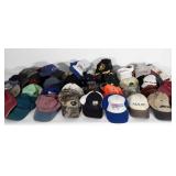 Approximately 40 hats. Most are advertising and