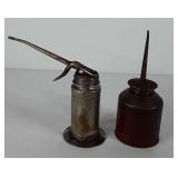 Two oil cans