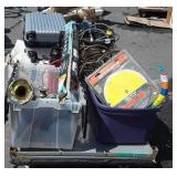 Skid of trumpet parts, suitcase, fans, garden