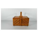 Fold out sewing box full of spools, pin cushion,