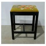 Stool with needlework floral seat. 14"×10"×17".