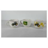 Three large John Deere coffee mugs by Gibson