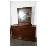 Eight drawer dresser with mirror.  Some scuffs.