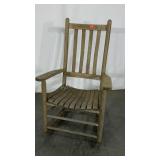 Porch rocker. Weathered finish.