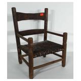 Child size Wooden chair. Seat is 7" from the