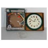 Singing bird clock in original box. Measures 14"