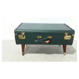 Older suitcase converted to low storage table.