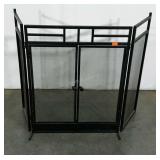 Fireplace screen with doors.