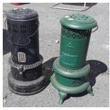 Two early Perfection Kerosene Heaters, one black