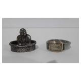 Budda figurine and Bulova watch