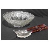 Glass salad bowl with glass fork and spoon