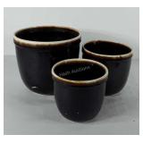 Three stoneware planters, 5"-7"