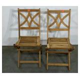 Two folding chairs, natural wood