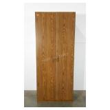 Laminated storage cabinet with interior shelves.