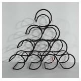 Metal wine rack.  Base measures 7x16 inches and