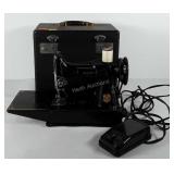 Singer feather lite model sewing machine with
