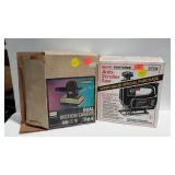 Two Craftsman power tool with boxes.