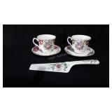 Two cup and saucers and server, server marked
