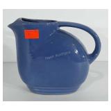 Blue stoneware pitcher. Measures 7" tall.
