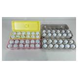Group of used golf balls, two cartons of Top