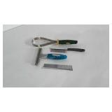 Pet grooming combs and brushes.