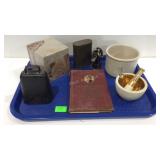 Cow bell, old Mr. Boston book, mortar and pestle,