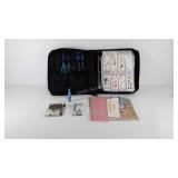 Organizer case full of scrapbooking supplies