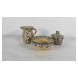 Roseville pottery creamer and sugar, and 5.5"