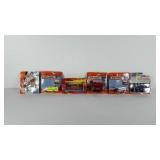 Six matchbox cars in original packaging, includes
