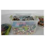 Group of Lego blocks in plastic tote, includes a