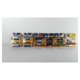 Six Jada Toys model cars in original packaging,