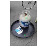 Propane tank partial full, with water heater tank