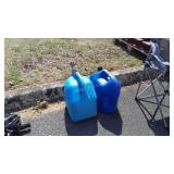 Two blue poly 5 Gallon Kerosene containers