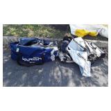 Two big Sports Bags with ice skates, some safety