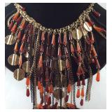 Simulated ruby and orange sapphire dualtone