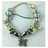 Silvertone charm bracelet with Murano style beads