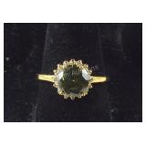 Size 8.5 costume ring green and white topaz