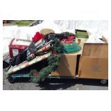 Skid of Christmas decorations, gift wrap, tree