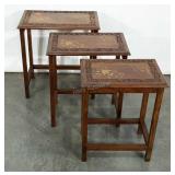 Three nesting tables with metallic inlay and