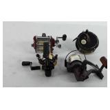 Four fishing reels, includes Shakespeare 2500,