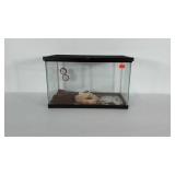 Glass aquarium.  Base measures 20"x10" and stands
