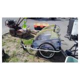 Burley Kids Cart, trails behind a Bicycle,