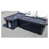 Two Husky 45 gallon stackable totes on wheels.