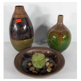 Pottery group two bases and center bowl