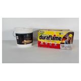 Unopened box of 6 Duraflame logs plus a bucket of