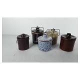 Five stoneware cheese crocks, 4"-5"