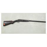 Columbia 12-gauge shotgun, has stock damage