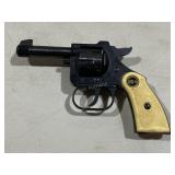 Rohm RG 10 revolver with holster.